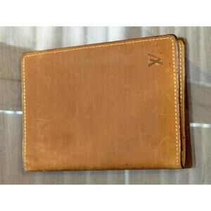 Louis Vuitton Nomade Leather Couverture Passport Case